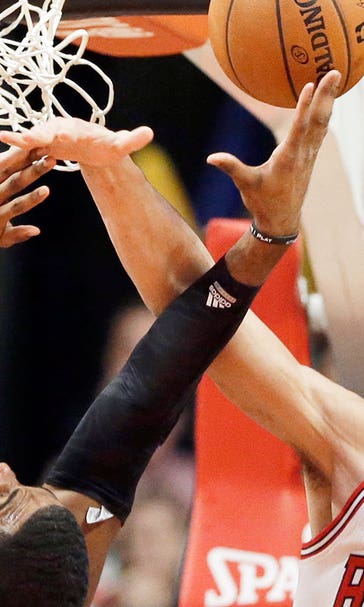 Noah shies from attention, leads Bulls to 94-87 win over Kings